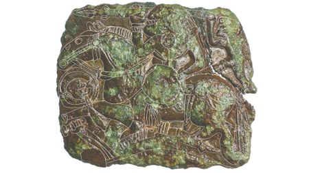 a close-up of a stamp with a warrior riding a horse