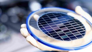 Somebody holding the Q.ANT photonic processor
