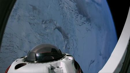 A screenshot of a video showing the Fram2 Dragon capsule moving over Antarctica