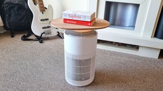 SwitchBot Air Purifier Table being tested by our reviewer